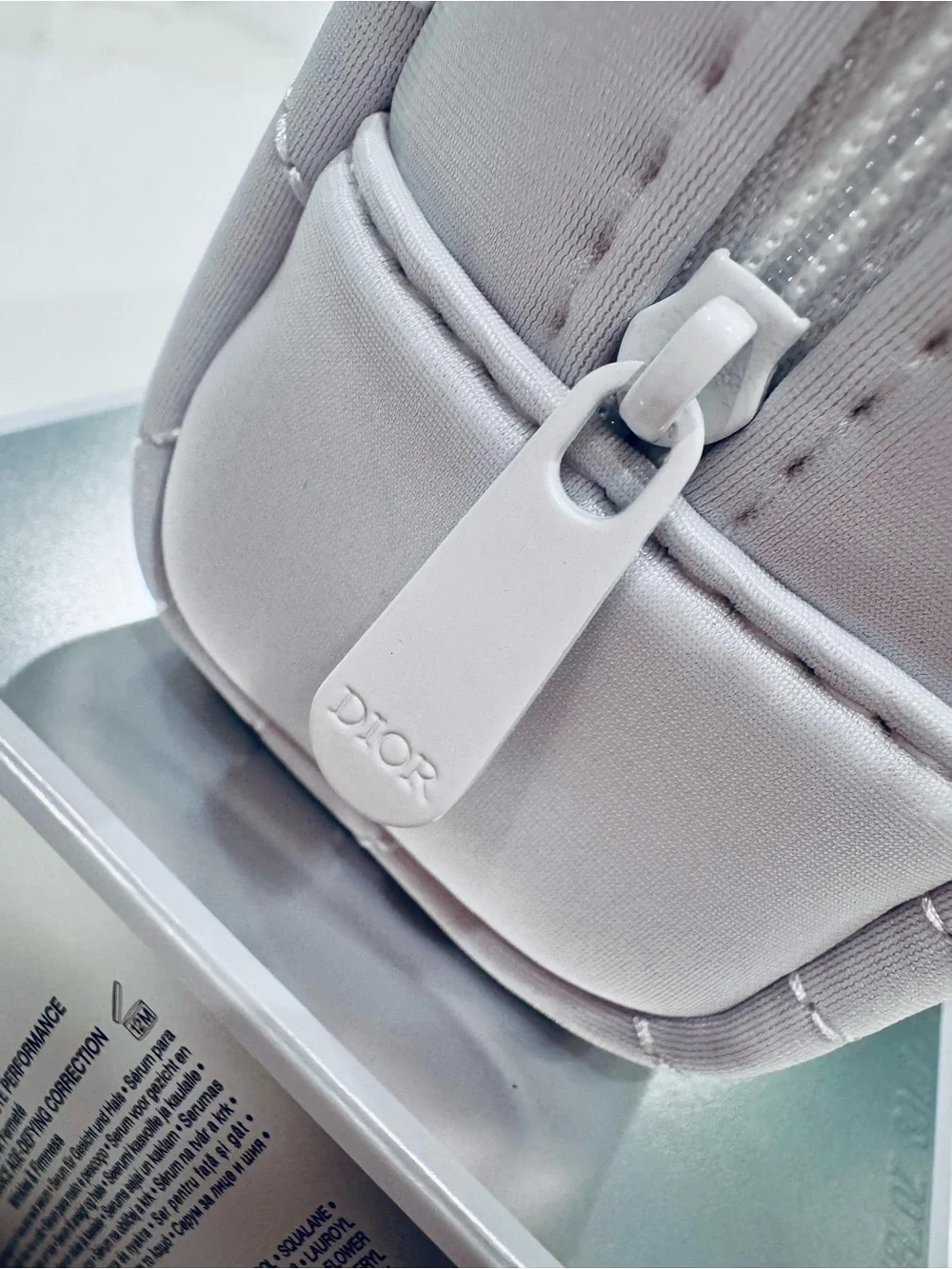 Dior White Quilted Cosmetic Pouch with Star Charm Keychain